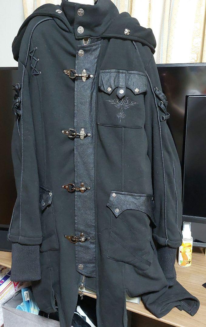 オッズオン Ozz Oneste バックルフード付きコート ブラック